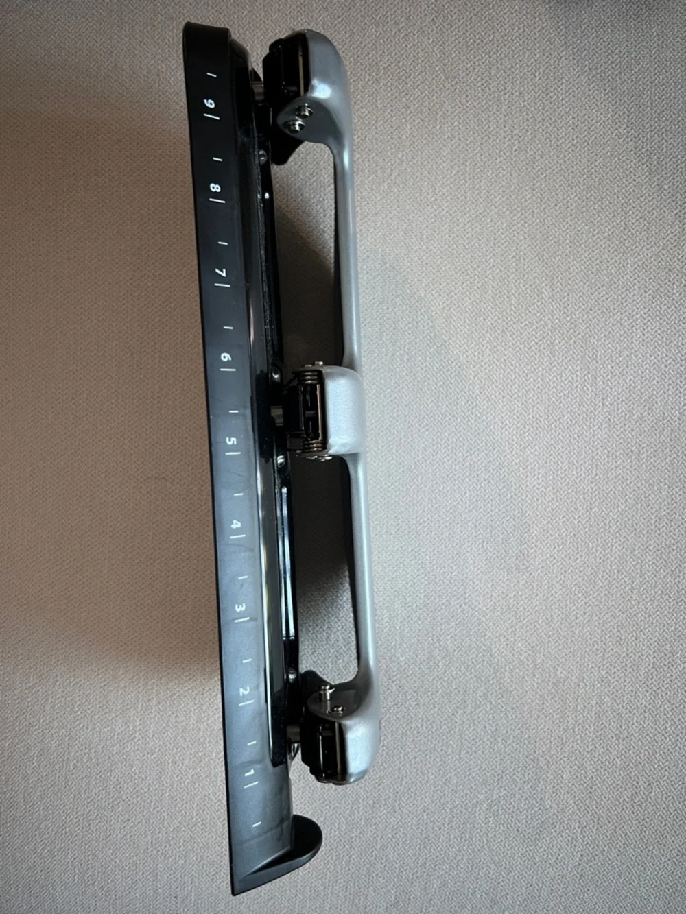 Bostitch Silver 3-Hole Heavy Duty Punch for Home Office. Has lock feature